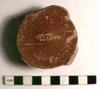 Samian Bowl Base with stamp of maker. 'Photo � M.C. Bishop'